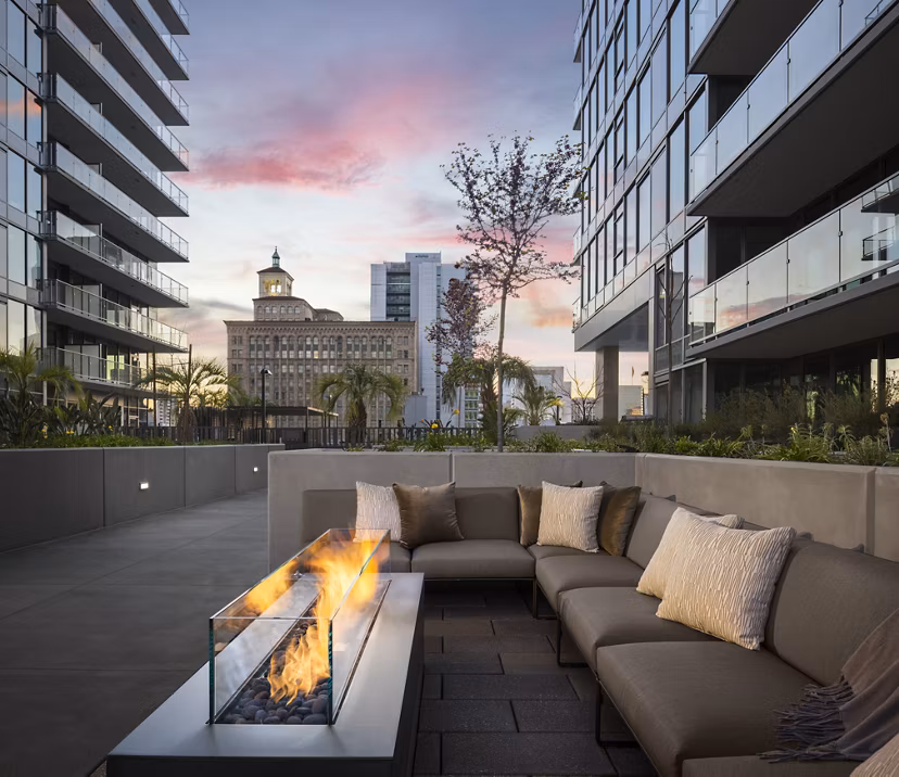 Cozy outdoor fire pit area at Diega Apartments, a luxury Greystar community in a vibrant urban setting