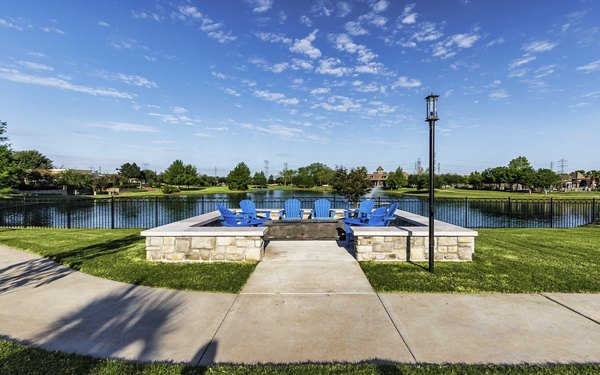 fire pit at Arista Riverstone Apartments