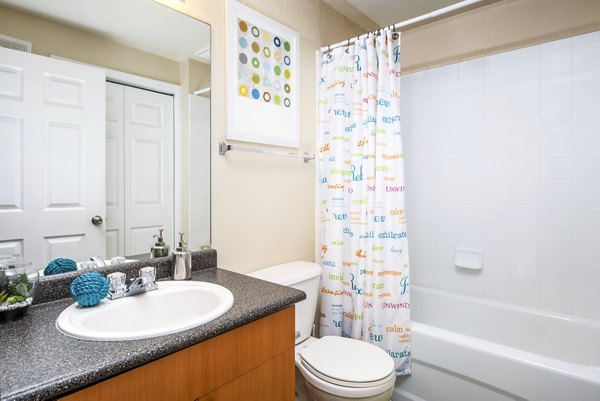 Modern bathroom with sleek fixtures at The Lofts Apartments