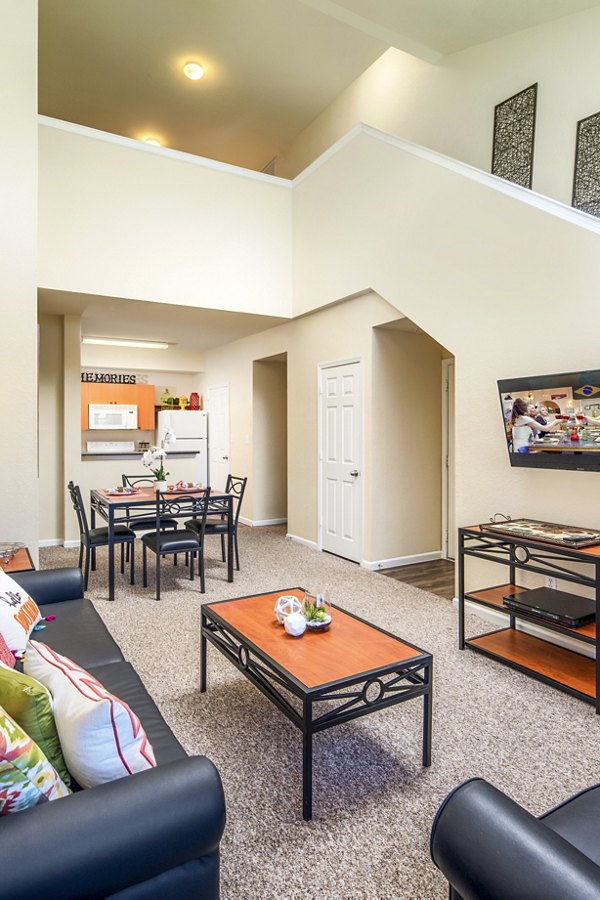 Spacious living room with modern decor at The Lofts Apartments luxury residences