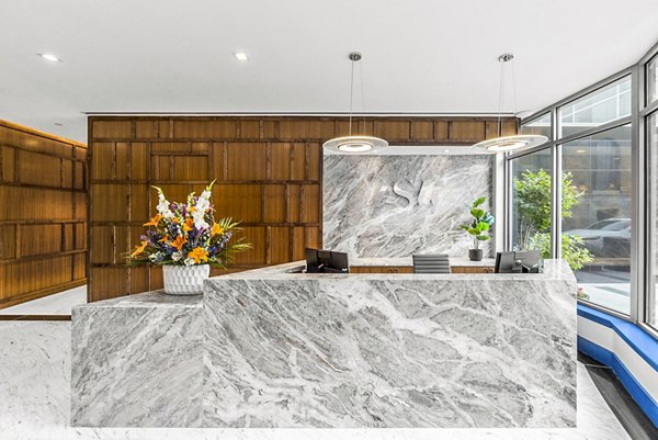 Front desk lobby with modern design at Atlantic Station West Apartments, featuring luxury amenities and contemporary furnishings