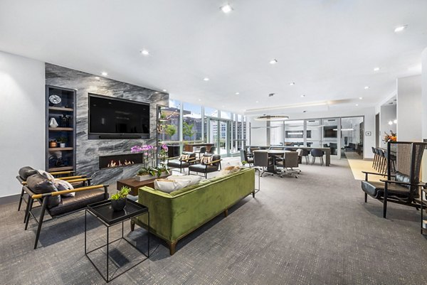 Modern clubhouse with cozy seating and entertainment options at Atlantic Station West Apartments
