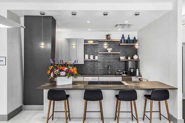 Modern clubhouse kitchen with stainless steel appliances at Atlantic Station West Apartments