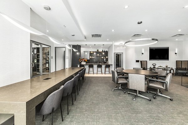 Clubhouse featuring modern seating and entertainment areas at Atlantic Station West Apartments