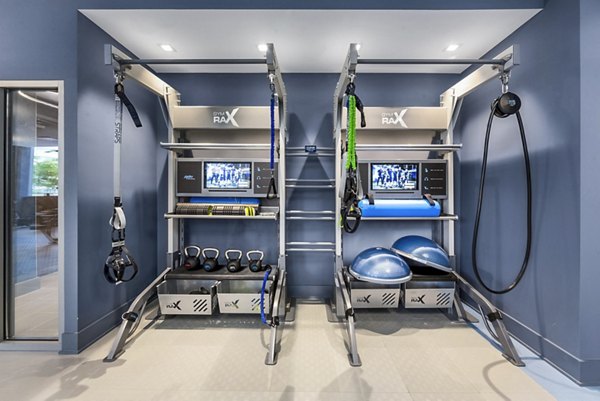 Fitness center with modern equipment at Atlantic Station West Apartments