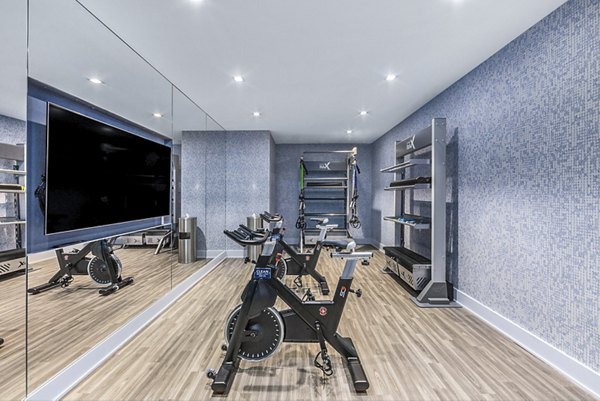 Yoga and spin studio featuring modern equipment at Atlantic Station West Apartments