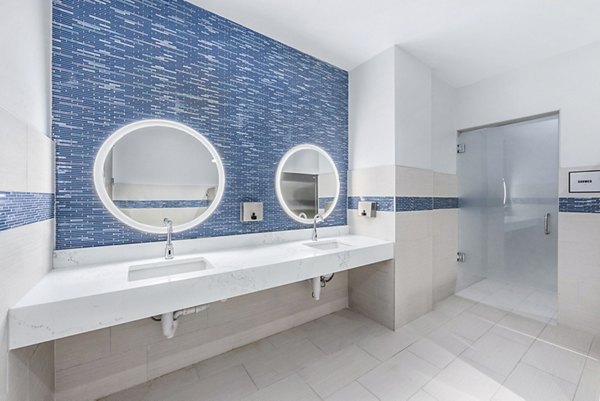 Modern showers in the fitness center at Atlantic Station West Apartments offering convenience and style