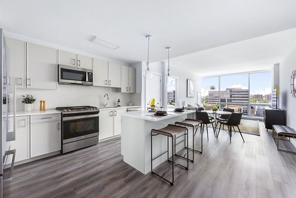 Modern kitchen with stainless steel appliances at Atlantic Station West Apartments