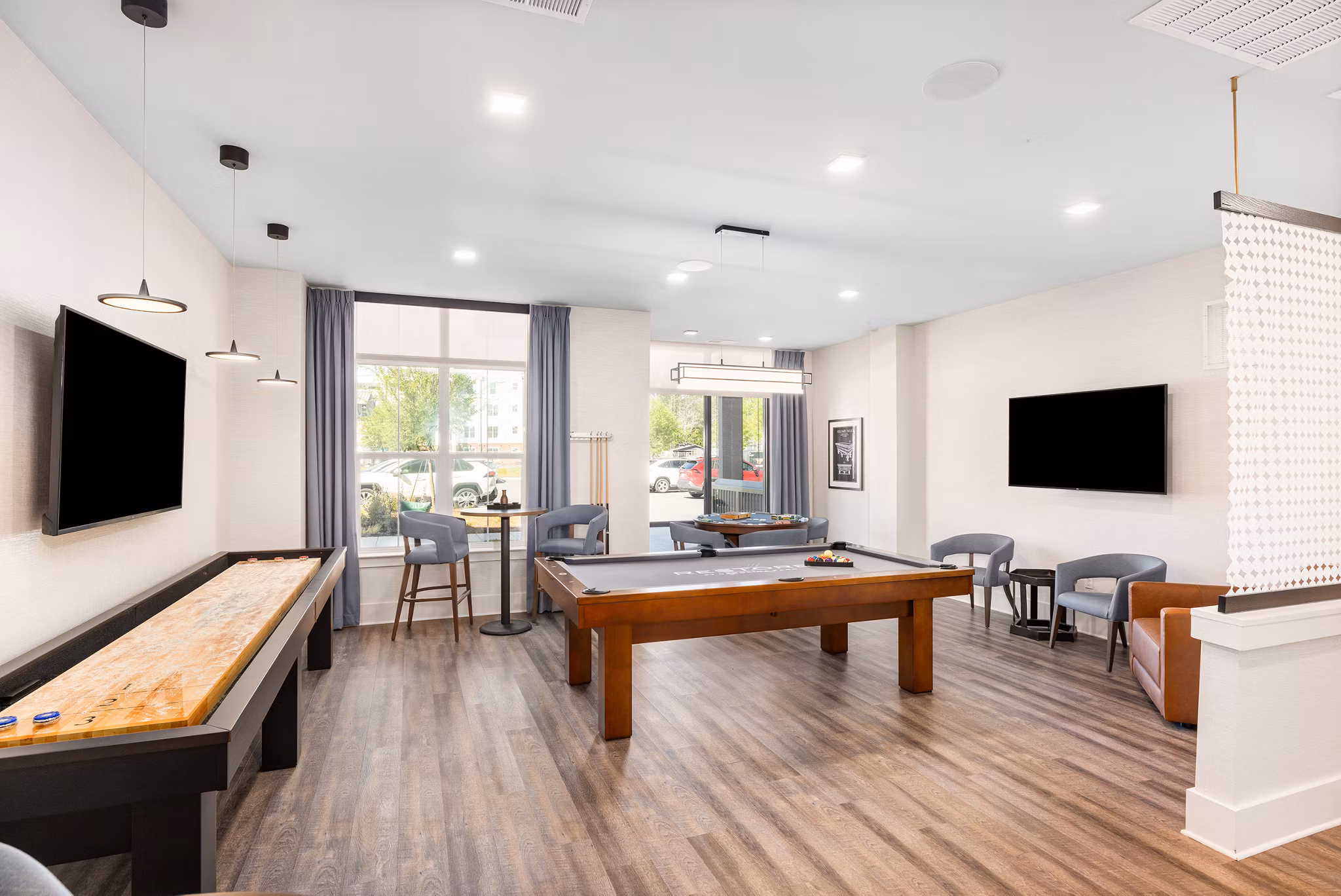 clubhouse game room at Restore at Carolina Park Apartments