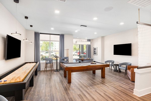 clubhouse game room at Restore at Carolina Park Apartments