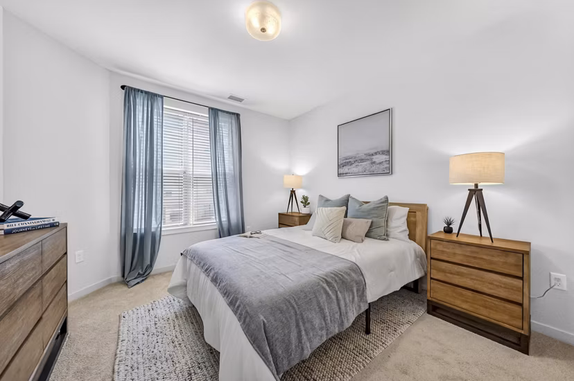 Spacious bedroom with modern decor at The Walcott Hackensack Apartments