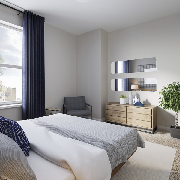 Spacious bedroom with modern decor at The Walcott Hackensack Apartments