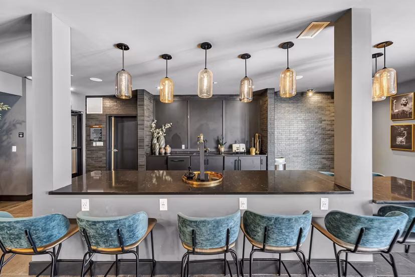 Game room with pool table and seating at The Walcott Hackensack Apartments