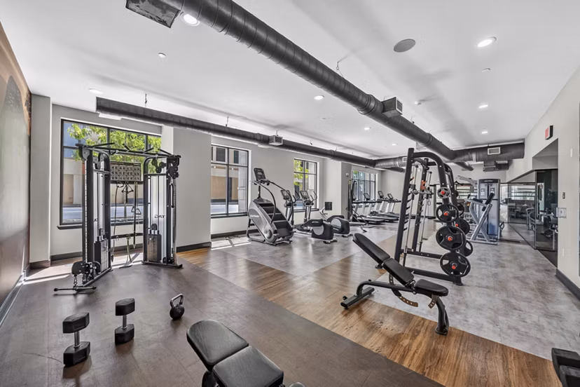 Modern fitness center with state-of-the-art equipment at The Walcott Hackensack Apartments
