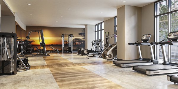 Modern fitness center with state-of-the-art equipment at The Walcott Hackensack Apartments