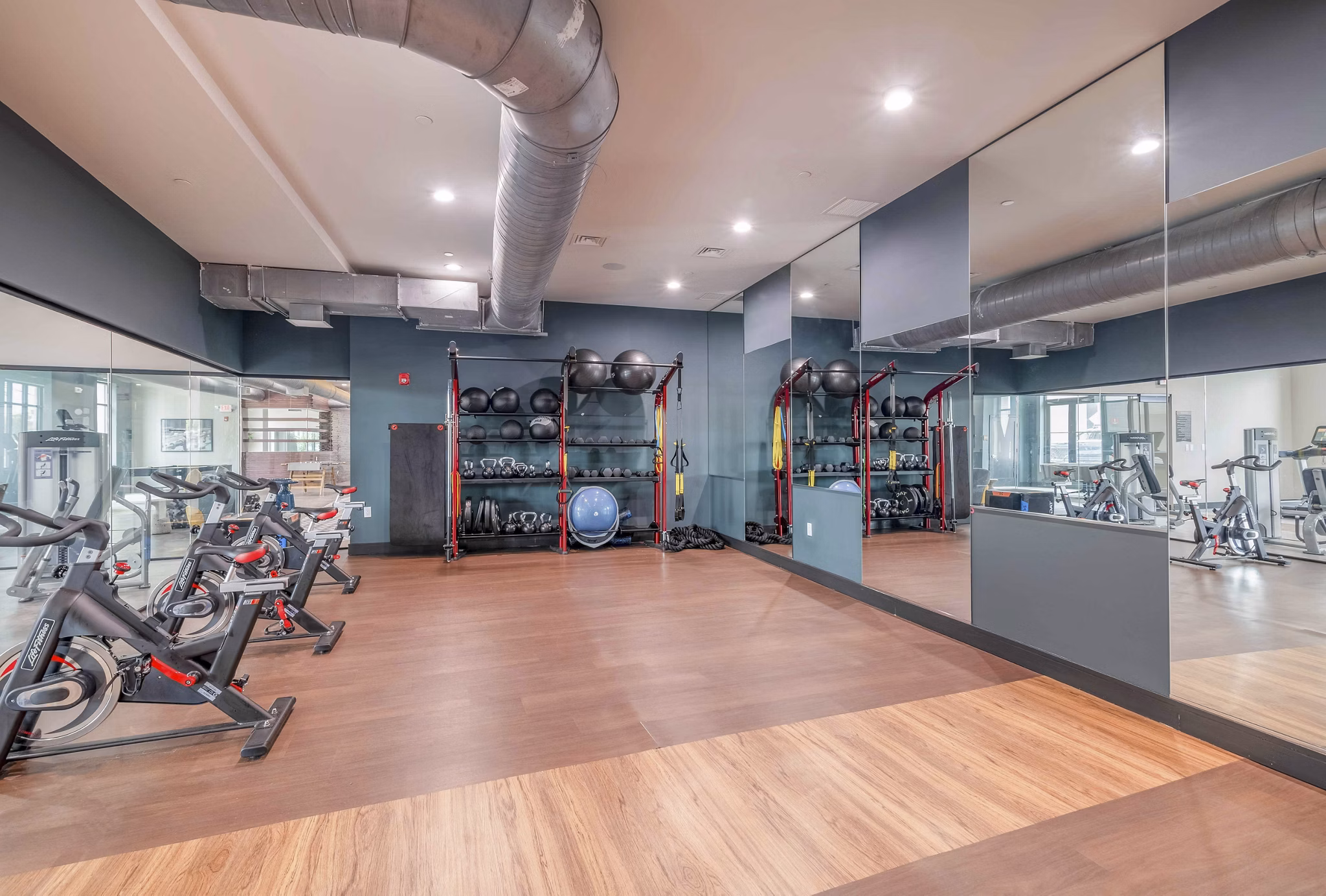 fitness center at The Walcott Hackensack Apartments