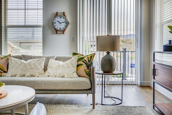 Modern clubhouse with lounge seating at Jules on 3rd Apartments