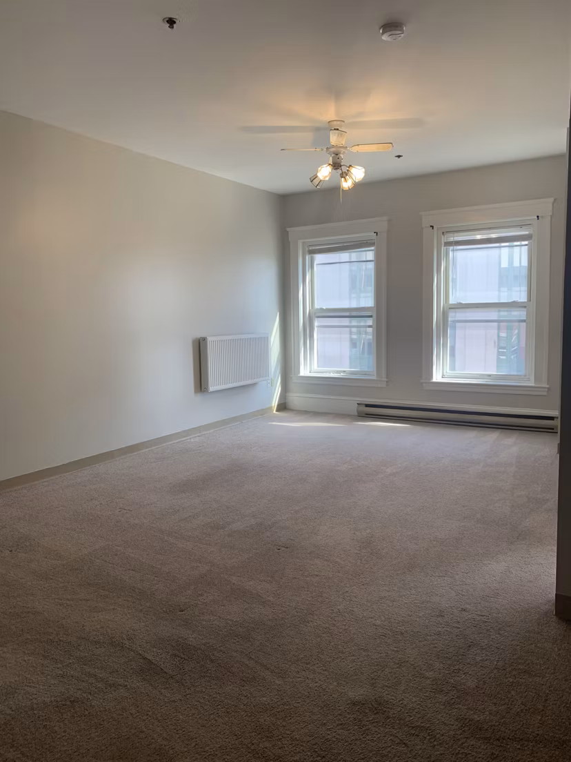 Cozy living room with modern furnishings at Colton Apartments