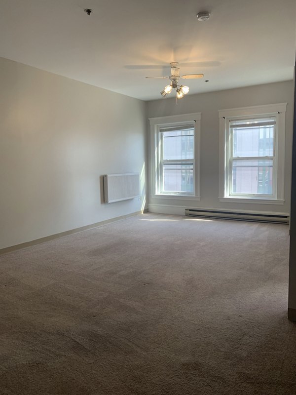 Cozy living room with modern furnishings at Colton Apartments