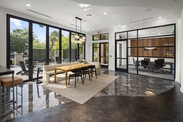 Elegant clubhouse interior with modern decor at Tapestry at Brentwood Town Center Apartments, perfect for gatherings and events