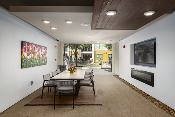 Clubhouse at Tapestry at Brentwood Town Center Apartments featuring modern design and ample seating areas