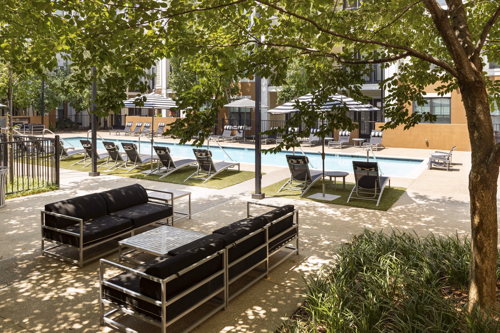 Courtyard featuring lush landscaping at Tapestry at Brentwood Town Center Apartments