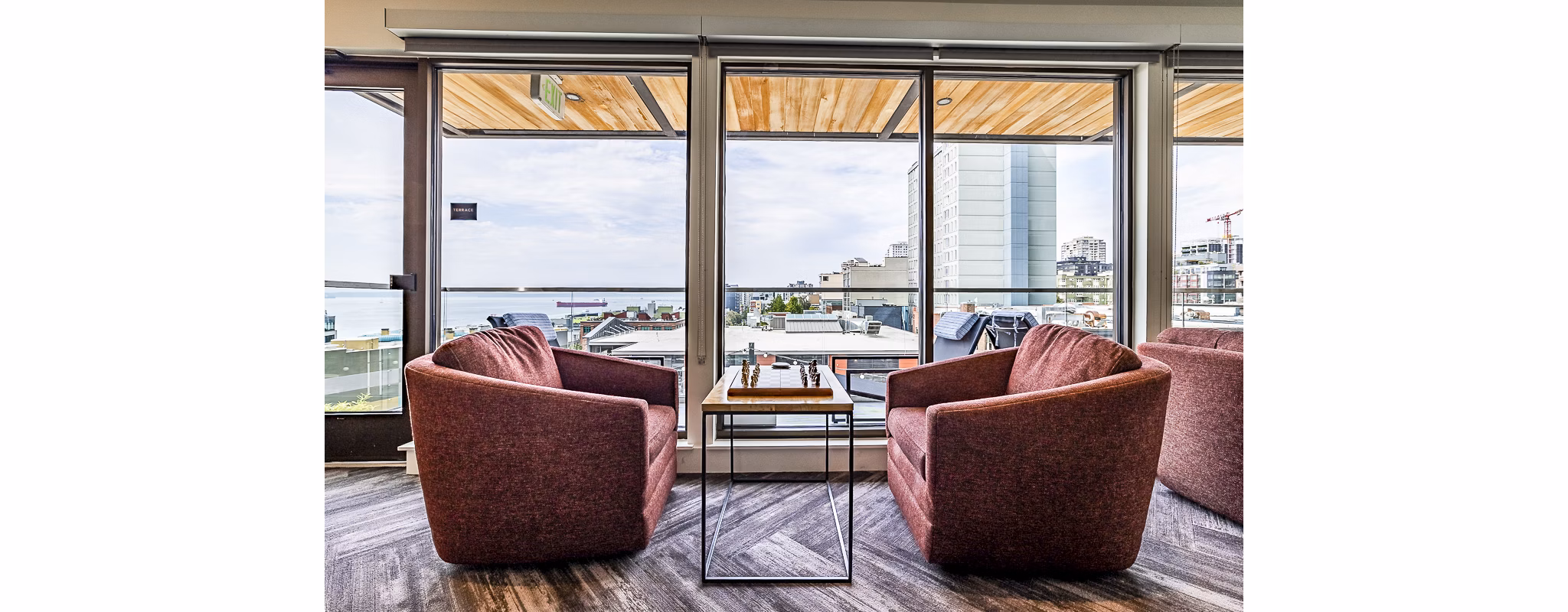 Clubhouse lobby with modern furnishings at Elara at the Market Apartments