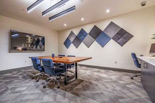 Clubhouse meeting facility with modern seating and presentation tools at Elara at the Market Apartments