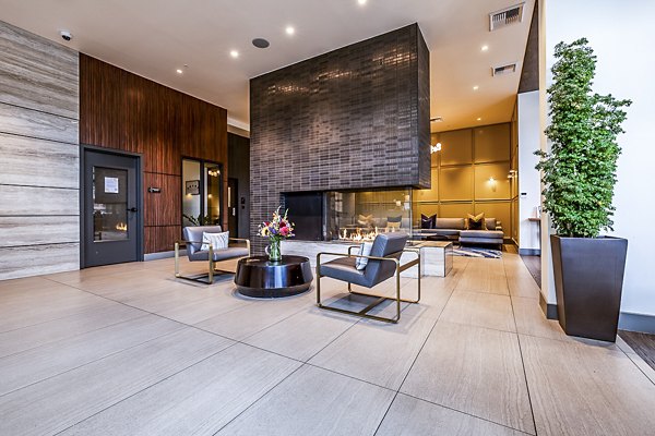 Modern clubhouse/lobby with elegant decor at Elara at the Market Apartments