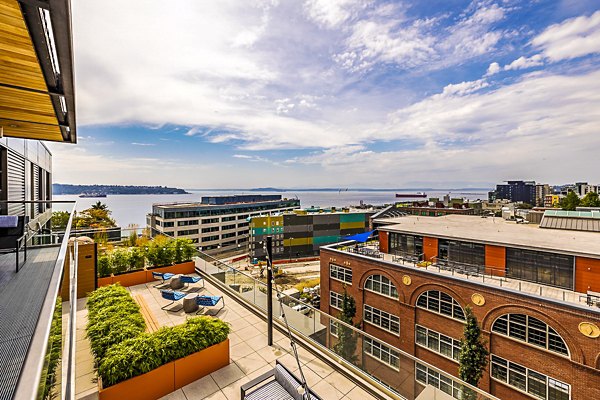 Private balcony with seating area at Elara at the Market Apartments offering city views