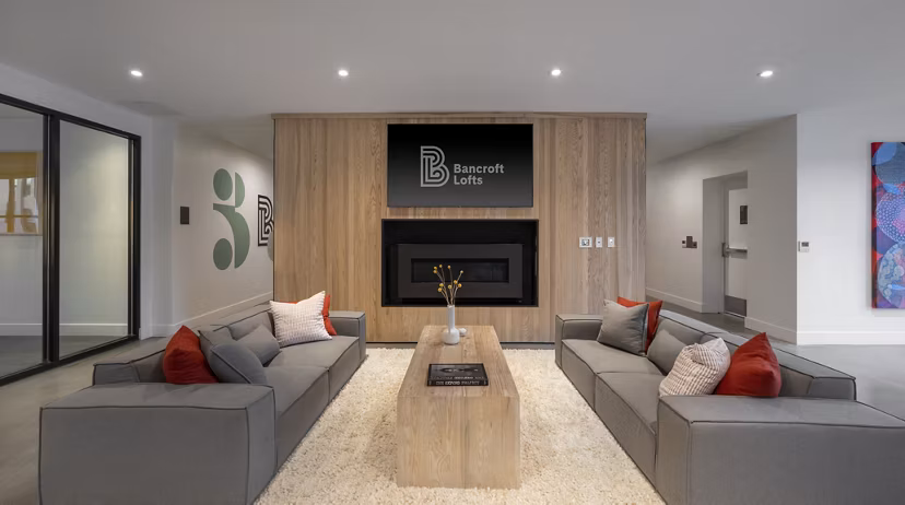 Clubhouse featuring modern design elements and comfortable seating at Bancroft Lofts luxury apartments
