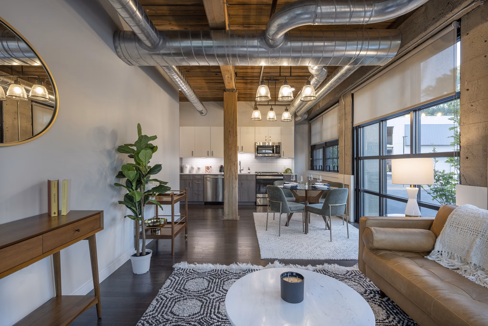 Clubhouse featuring modern decor and cozy seating areas at Bancroft Lofts, offering a luxurious apartment lifestyle