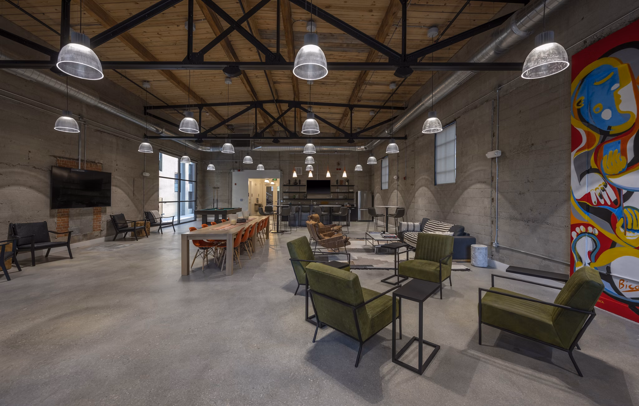 Clubhouse featuring modern decor and social lounge at Bancroft Lofts luxury apartments