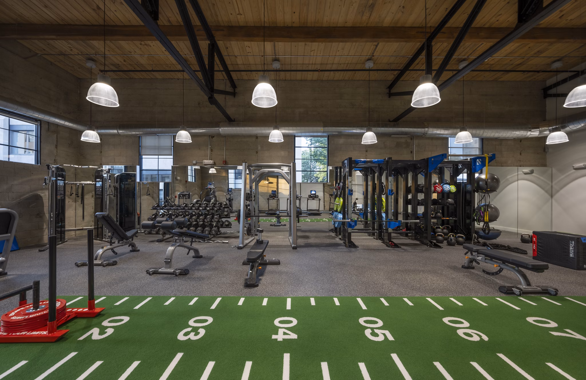 State-of-the-art fitness center at Bancroft Lofts featuring modern equipment and spacious workout areas