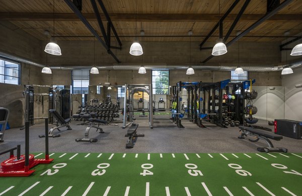State-of-the-art fitness center at Bancroft Lofts featuring modern equipment and spacious workout areas