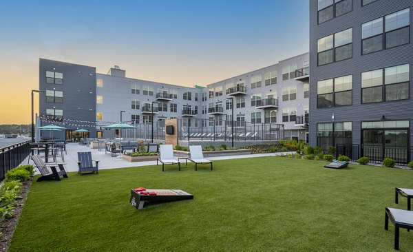 Sport court at Bancroft Lofts: Modern indoor basketball court with polished wooden floors and high ceilings, ideal for athletes and fitness enthusiasts