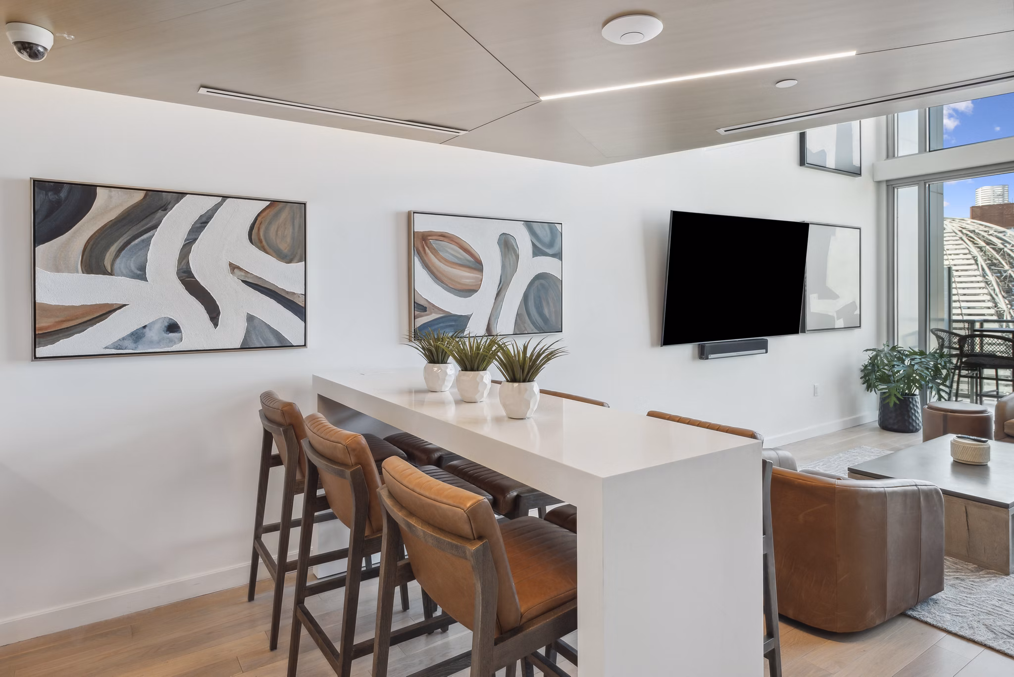 Clubhouse featuring modern dÃ©cor and seating at K1 Apartments, a luxury living space in downtown San Diego