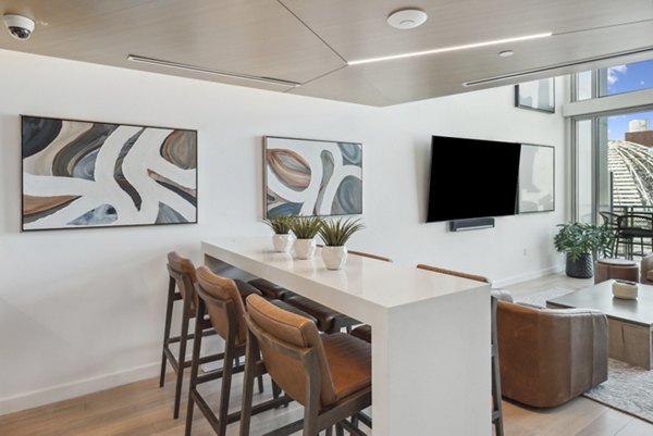 Clubhouse featuring modern dÃ©cor and seating at K1 Apartments, a luxury living space in downtown San Diego