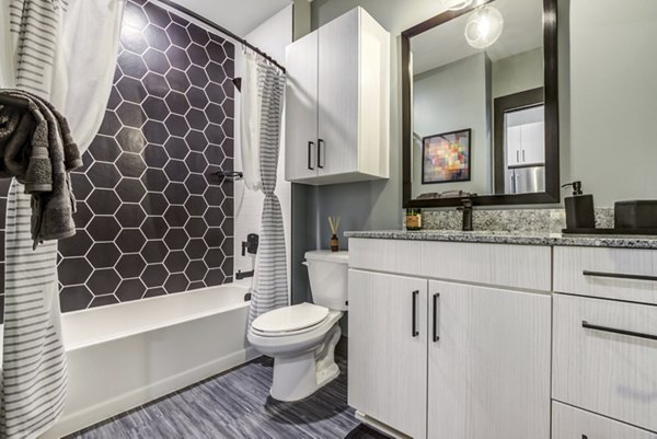 Spacious bathroom with modern fixtures at Centro Railyard Apartments