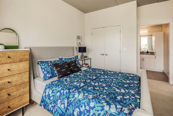 Spacious bedroom with modern decor at The Hamilton I Apartments, Greystar luxury apartments