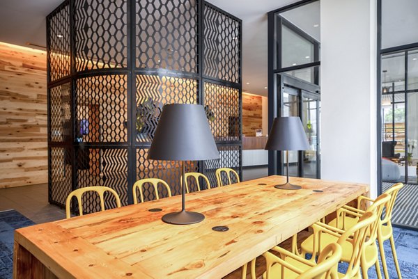 Modern meeting facility with ergonomic seating at The Hamilton I Apartments