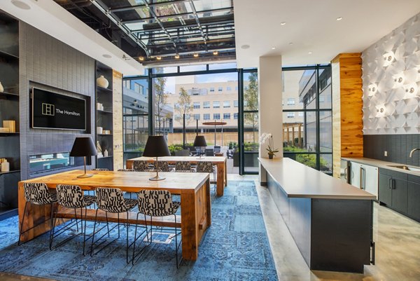 Elegant clubhouse with modern decor at The Hamilton I Apartments, ideal for luxury events and gatherings