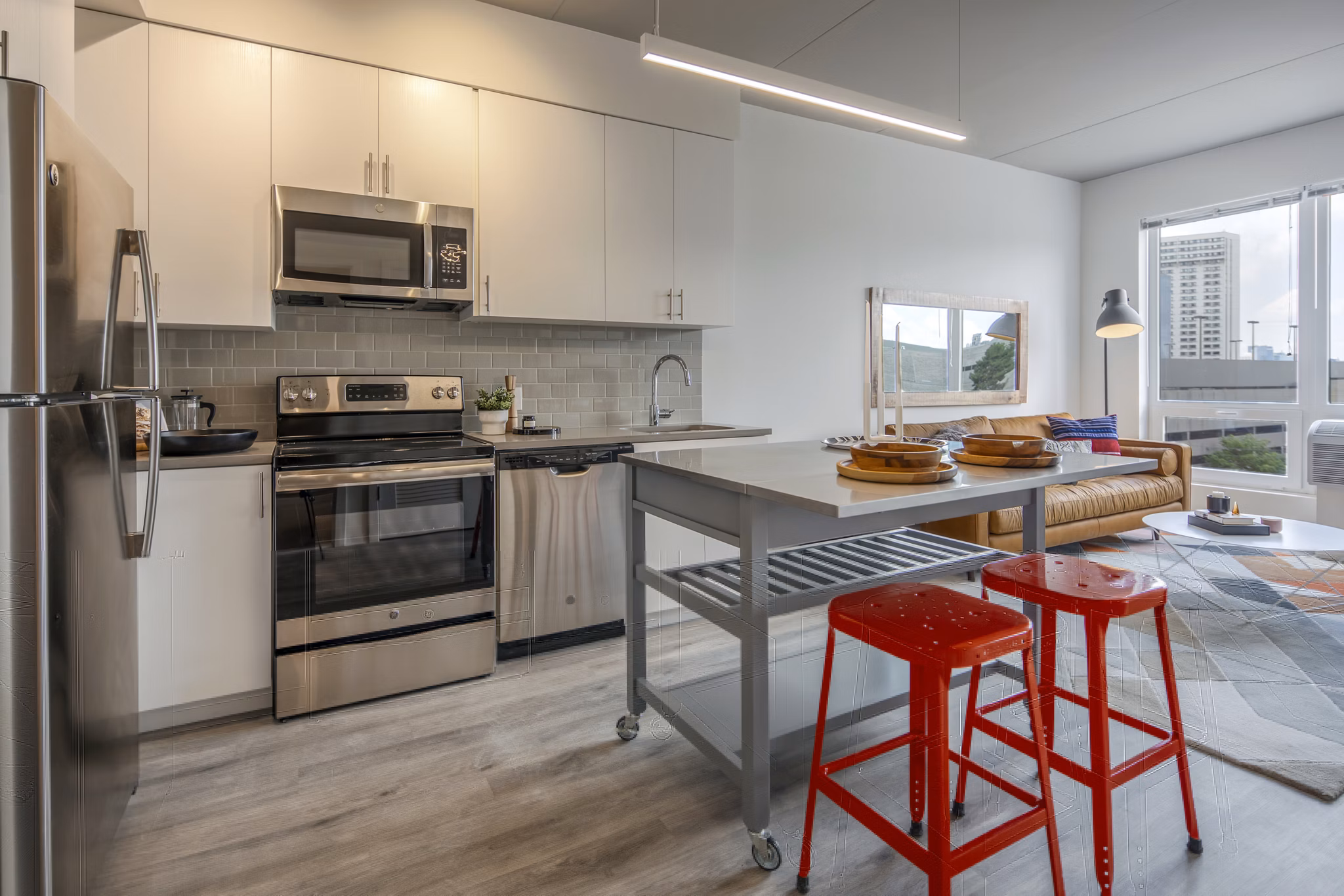 Modern kitchen with stainless steel appliances at The Hamilton I Apartments
