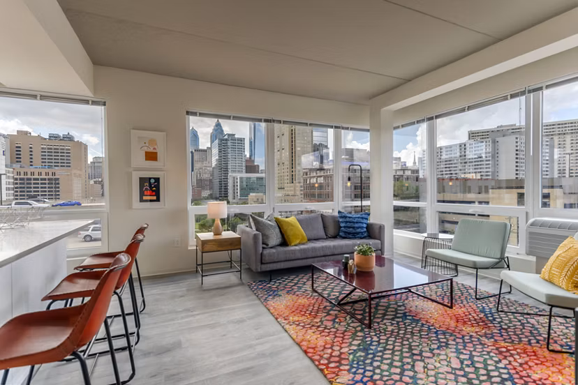 Modern living room with sleek furnishings at The Hamilton I Apartments Perfect for those seeking luxury and comfort in a vibrant community