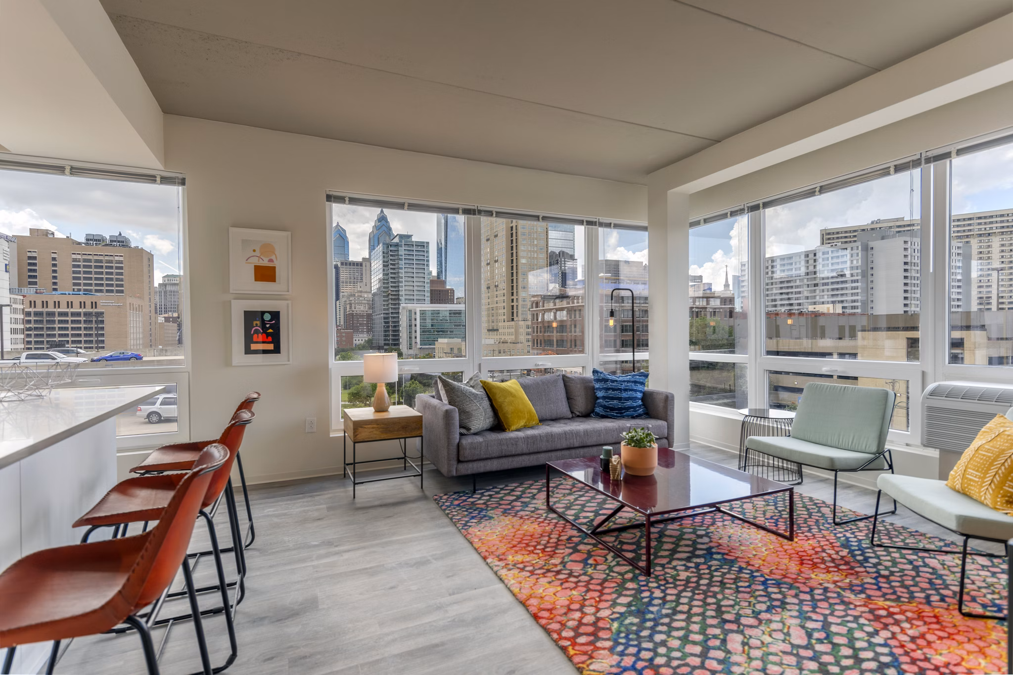 Modern living room with sleek furnishings at The Hamilton I Apartments Perfect for those seeking luxury and comfort in a vibrant community