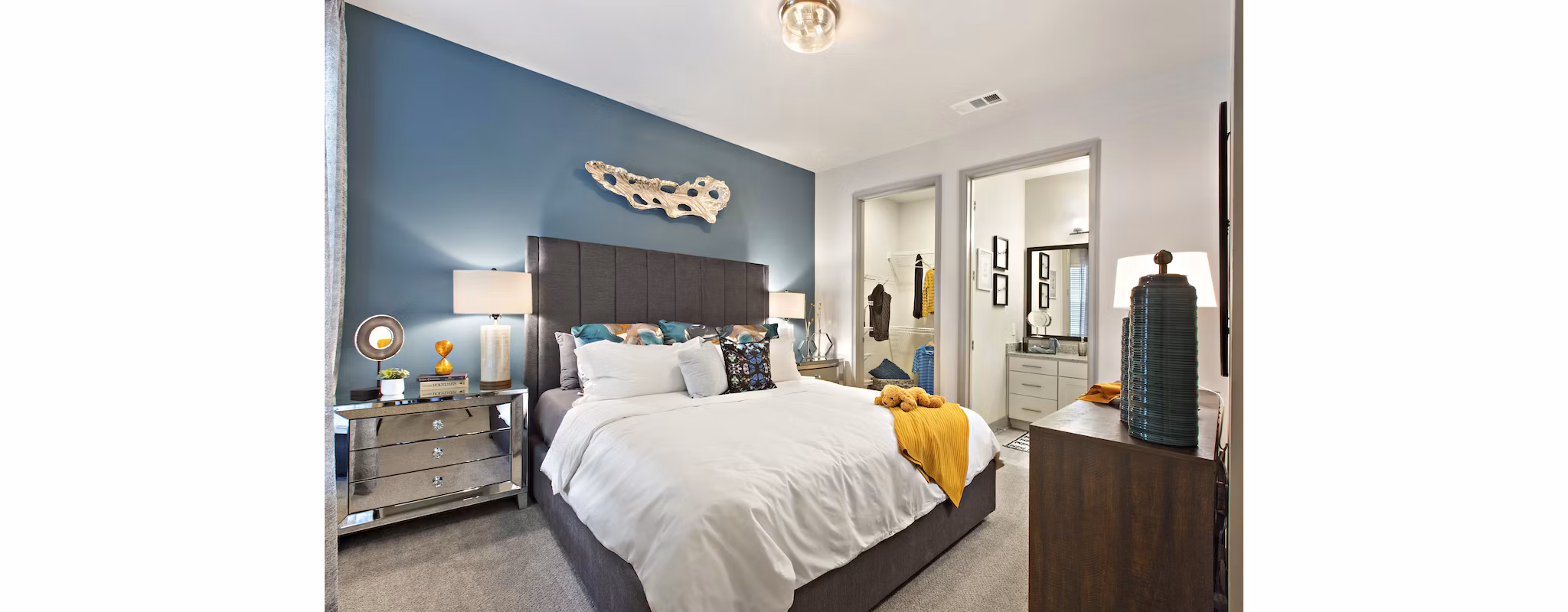 Cozy bedroom with stylish decor in Newbergh ATL Apartments