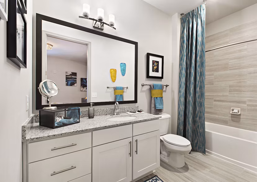 Modern bathroom with sleek fixtures at Newbergh ATL Apartments