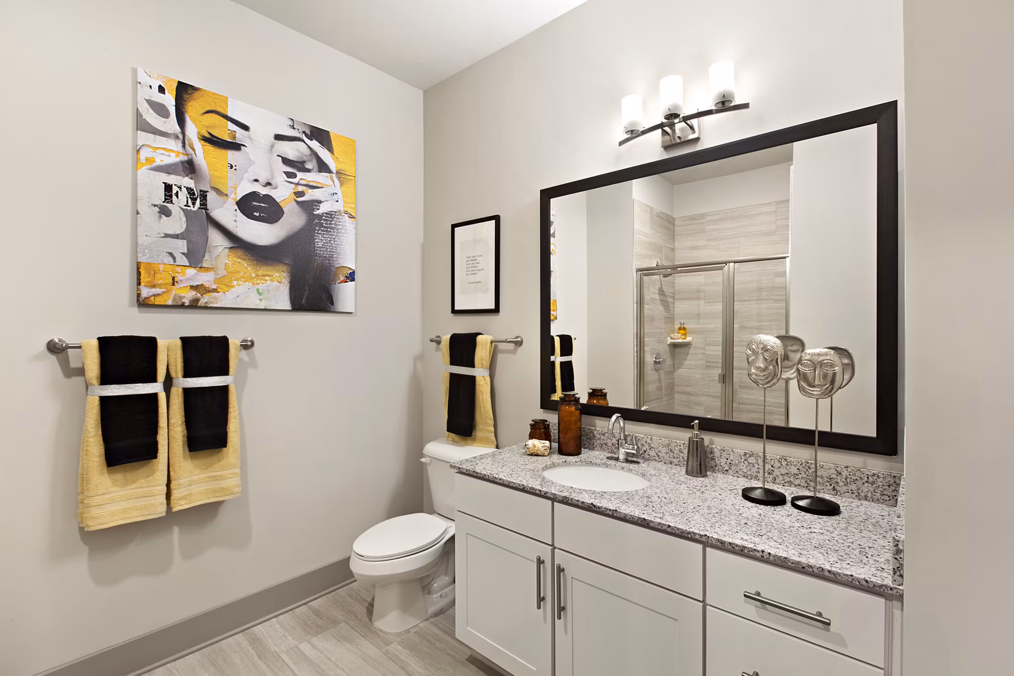 Bathroom featuring sleek fixtures and a modern design in Newbergh ATL Apartments