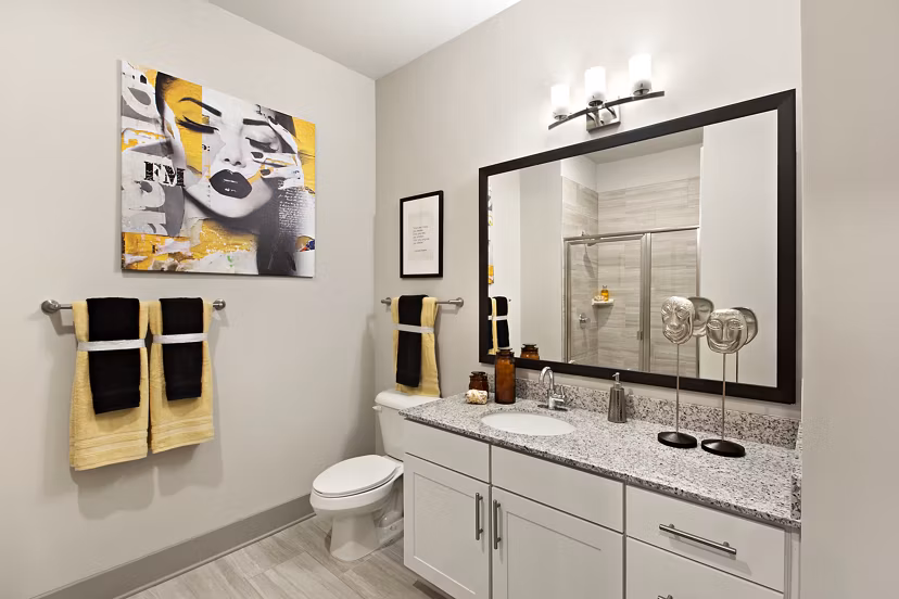 Bathroom featuring sleek fixtures and a modern design in Newbergh ATL Apartments