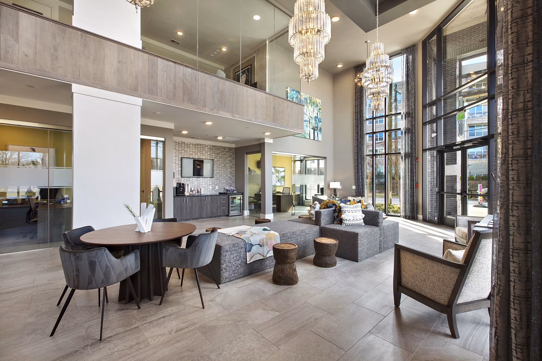 Clubhouse featuring modern decor and seating at Newbergh ATL Apartments